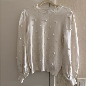 Storia Cream Sweater with Pom Pom Accents